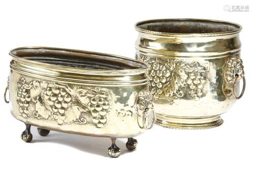 Two late 19th century Dutch brass jardinières, each decorated with a grapevine and with lion's