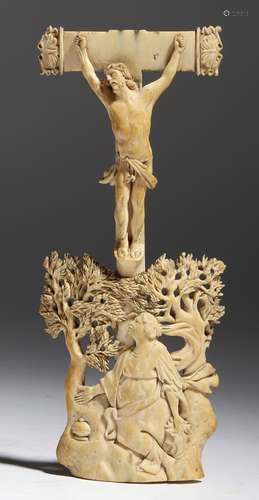 λ A German carved ivory Corpus Christi mount, of curved form, depicting Jesus on the cross above