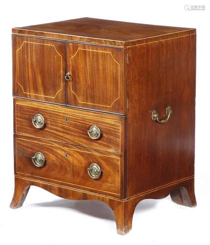 A mahogany bedside cupboard, inlaid with boxwood stringing, the crossbanded top above a pair of