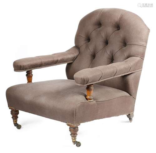 A late Victorian walnut open easy armchair by Howard & Sons Ltd, with later button upholstery,