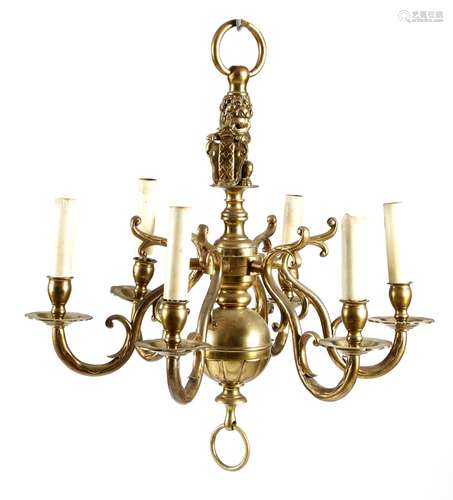 A Dutch brass six-light chandelier in 17th century style, the stem with a lion holding a coat of