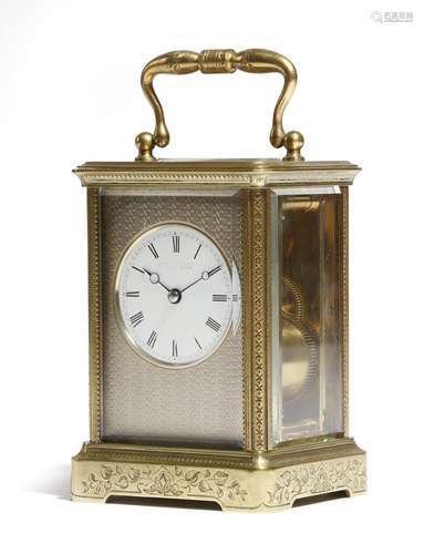 A late 19th century French gilt brass carriage clock, the eight day movement with a platform lever