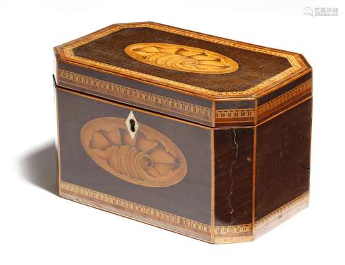 λ A George III harewood tea caddy, of canted rectangular form, inlaid with banding and marquetry