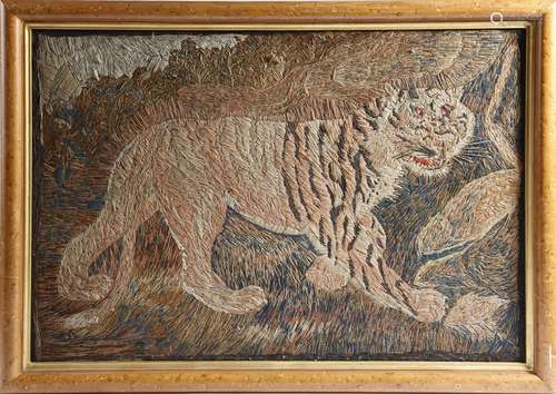 A 19th century naive woolwork picture of a tiger, 47 x 67.9cm, in a faux bird's eye maple frame.