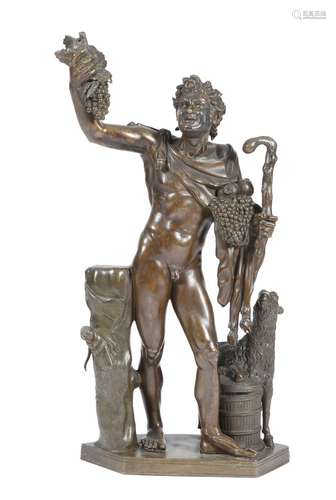 After the antique. An Italian bronze Grand Tour figure of a drunken faun, holding grapes, a