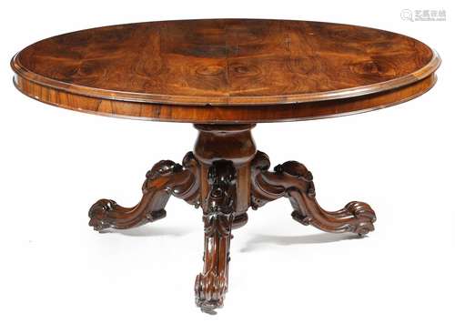 λ A William IV rosewood breakfast table, the circular tilt-top with a moulded edge, on a baluster