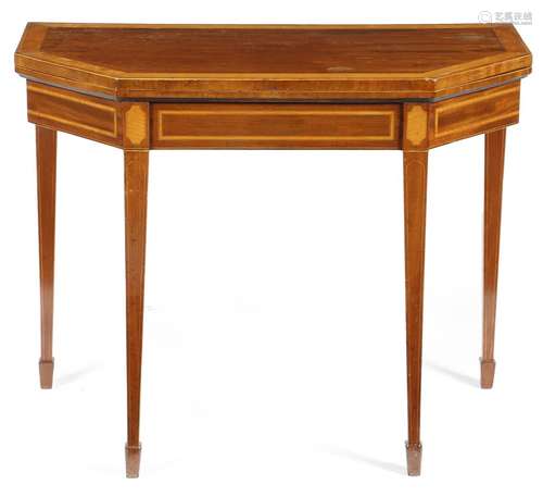 λ A George III mahogany card table, of canted form, the fold-over top banded in rosewood and