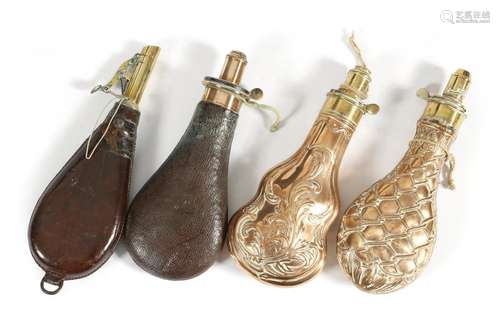 Two Victorian copper and brass powder flasks, with embossed decoration, one as a game bag and with