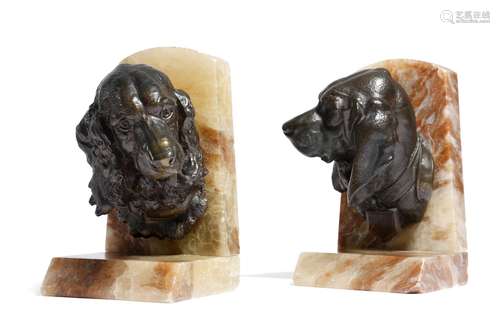 After Prosper Lecourtier (French 1851-1924). A pair of onyx and bronzed spelter bookends, each