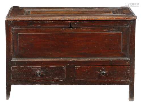 A George II Welsh stained pine mule chest, with a fielded panel hinged top, revealing a vacant