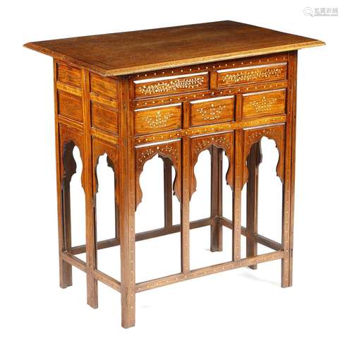 An Anglo-Indian hardwood occasional table, the rectangular detachable top inlaid with ebony