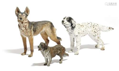 Three Austrian cold painted bronze models of dogs, comprising: a spaniel, a German shepherd, and a