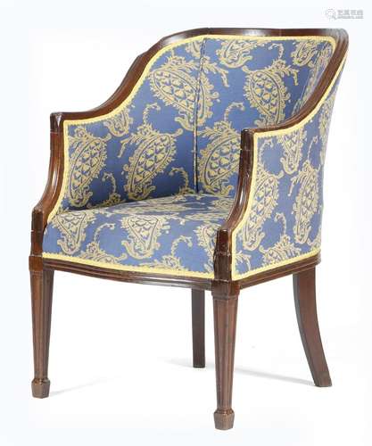 A George III mahogany tub chair, with a moulded frame, on square tapering front legs and spade