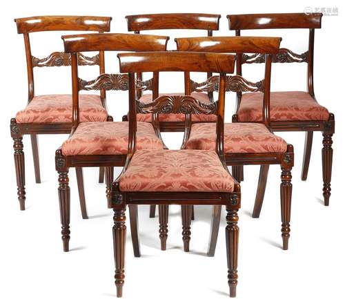 A set of six Regency goncalo alves side chairs attributed to Gillows, each with a curved top rail,