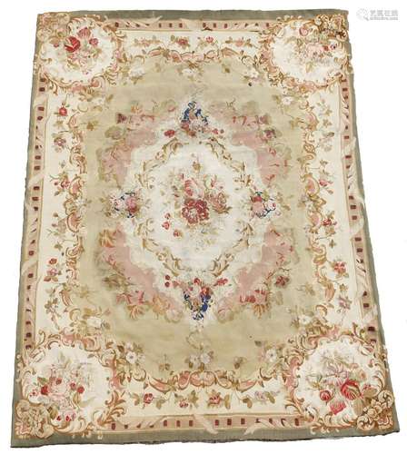 A French Aubusson tapestry rug, in Louis XVI style, decorated with roses, 198 x 145cm.