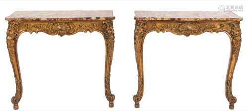 A pair of French carved giltwood rectangular console tables:,