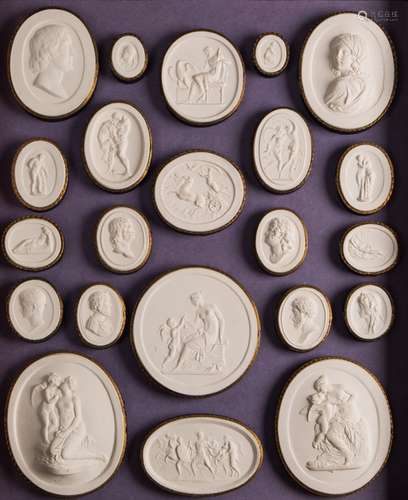 A collection of 19th century Grand Tour plaster cameo gems: contained in four fitted trays,