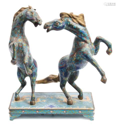 A Chinese cloisonne horse group: of two rearing horses, decorated with dragons,