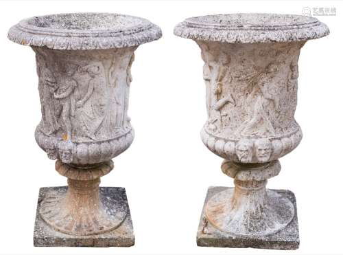 A pair of reconstituted stone garden urns: of campagna shape,