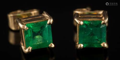 A pair of square emerald single-stone ear-studs: each with a square-cut emerald approximately 5mm
