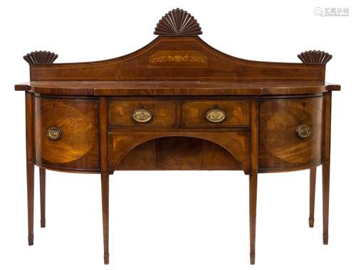 An early 19th Century mahogany and inlaid sideboard:, of D-shaped breakfront outline,