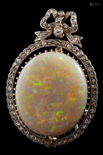A homogenous black and white opal and diamond brooch: the oval opal stated to be approximately 21.