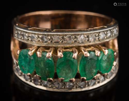 An emerald and rose-cut diamond cluster ring: with central row of graduated, oval emeralds,