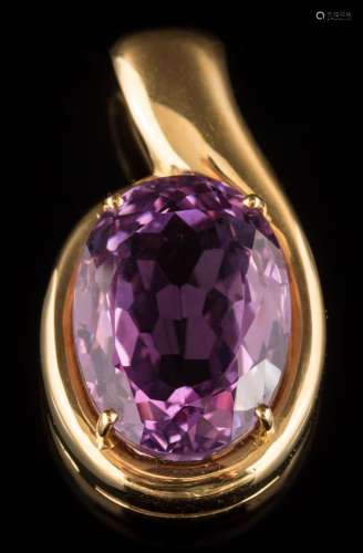 An oval amethyst single-stone pendant: the oval amethyst approximately 20mm x 15mm in a four-claw