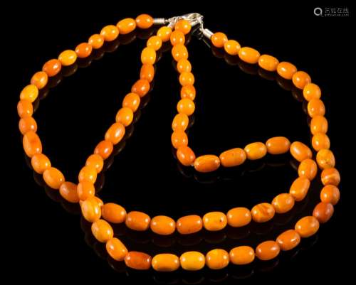A graduated amber bead,
