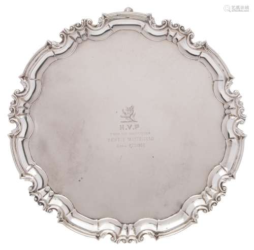 An Edward VII silver circular salver, maker William Hutton & Sons Ltd, London, 1906: inscribed,