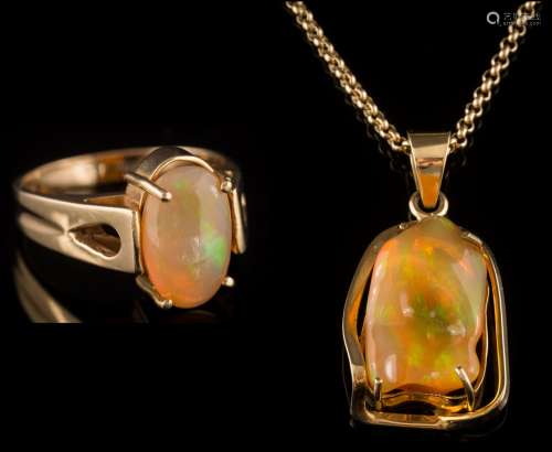 A yellow metal and irregular jelly opal,