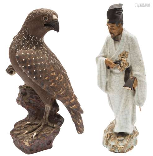 A Japanese Bizen stoneware figure of an eagle and a crackle glazed figure in the style of Makuzu