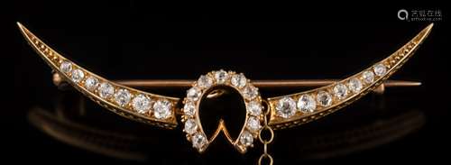 A late 19th century gold and diamond crescent brooch: with central horseshoe motif,