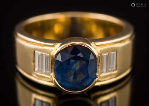 A sapphire and diamond five-stone ring: centring an oval sapphire approximately 8.