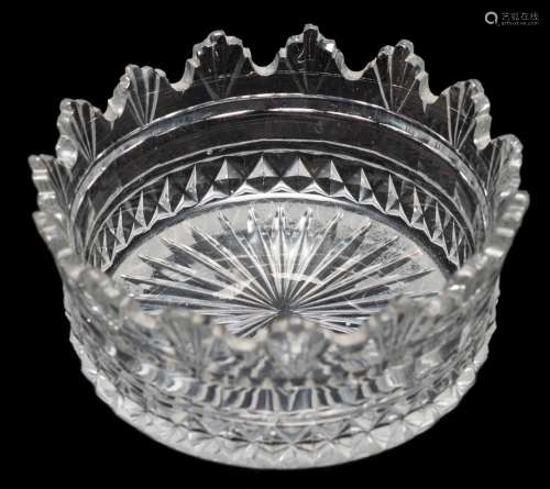 An unusual early 19th century cut glass coaster: with foliate and fan cut rim and star cut base,