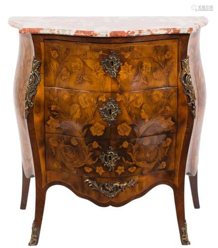 A French walnut, kingwood floral marquetry and gilt metal mounted serpentine fronted bombe commode:,