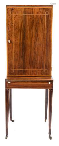 An early 19th Century rosewood and inlaid collectors cabinet on stand:,