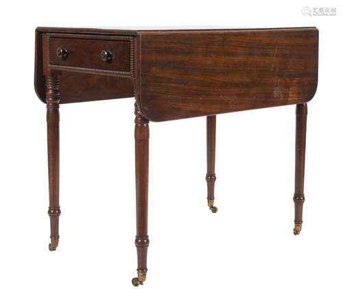 A George IV mahogany Pembroke table:, the hinged top with rounded corners,