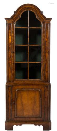 A walnut veneer domed upright display cabinet in the Queen Anne taste:,