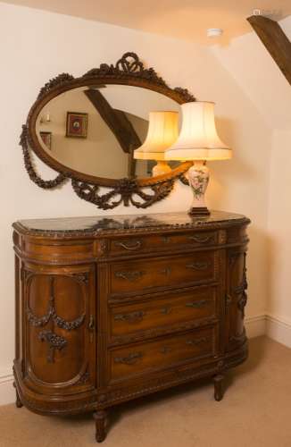 An extensive French carved walnut ten piece bedroom suite:,