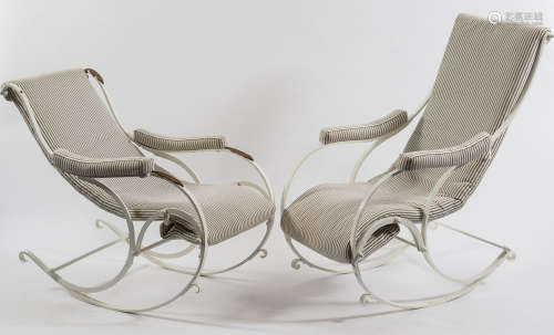 A pair of curved iron frame and later white and gilt painted rocking armchairs:,