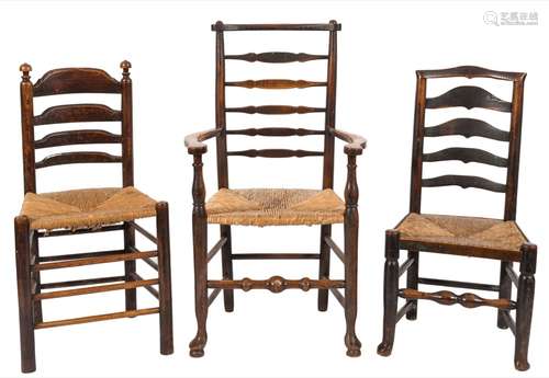 A set of four early 19th century elm and ash ladderback dining chairs:,