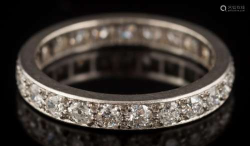 A diamond eternity ring: pave-set with round brilliant-cut diamonds estimated to weigh a total of 1.