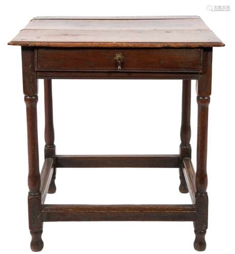 An early 18th Century oak rectangular side table:, the overhanging top with a moulded edge,