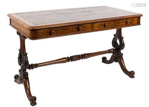 A Victorian carved walnut and marquetry rectangular writing table:,