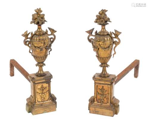 A pair of French gilt brass urn chenets:,
