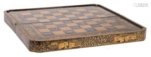 A late 19th century Chinese export lacquer folding chess board: decorated to the sides with