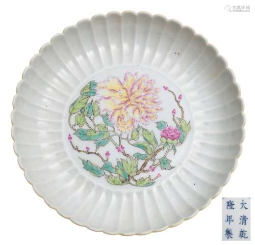 A Chinese yellow ground famille rose 'peony' dish: with fluted rim,