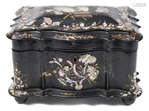 A Victorian papier mache and mother of pearl inlaid tea caddy: of cartouche-shaped outline,