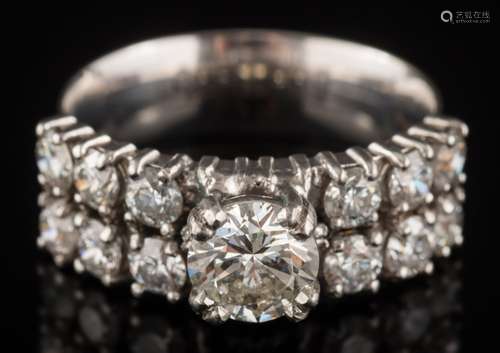 A diamond two-row cluster ring: with principal circular brilliant-cut diamond approximately 0.